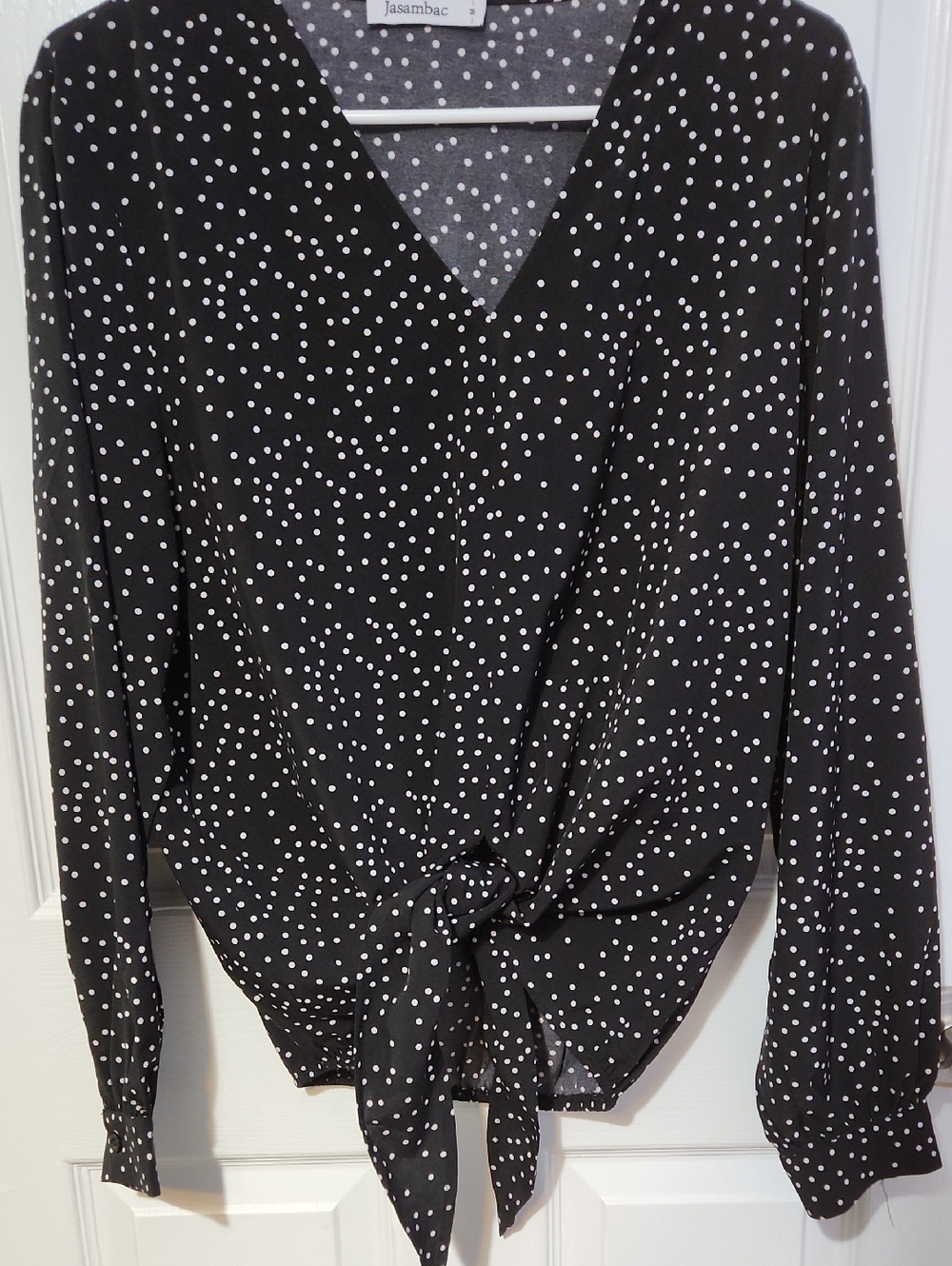 Black Polka Dot Tie-Front V-Neck Blouse by Jasmbac
